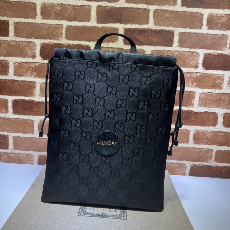 G*u*i top handle bags